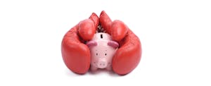 Piggy bank with boxing gloves either side